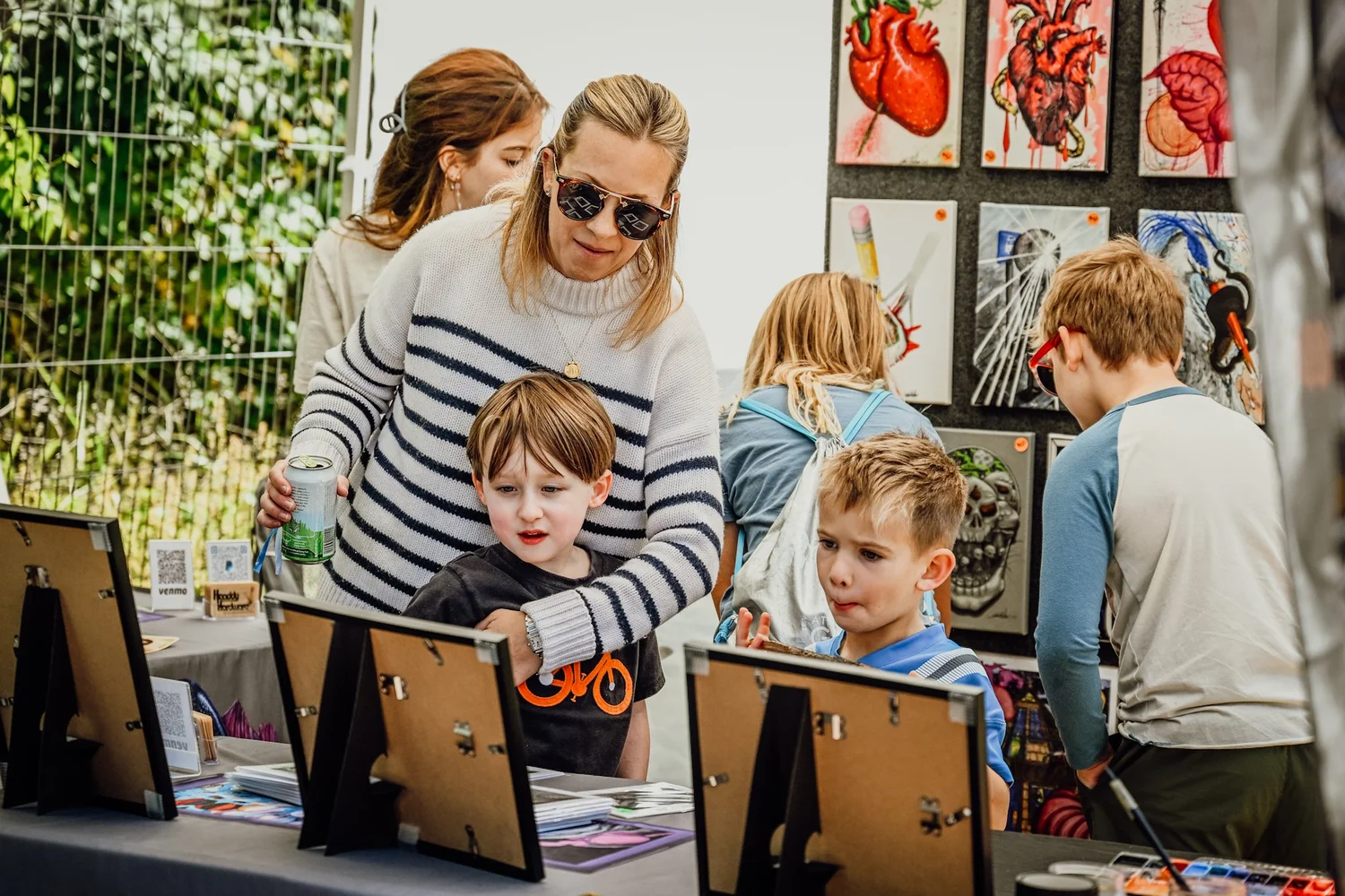 Kids browsing the art vendors on Shakedown Street at Touch of Brews 2022