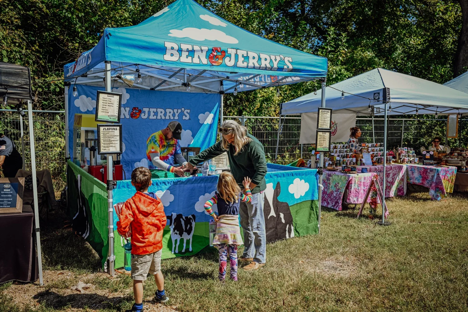 Kids at the Ben and Jerrys tent on Shakedown Street at Touch of Brews 2022