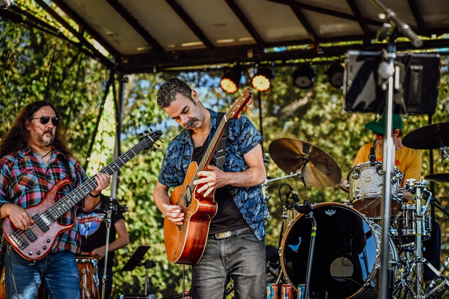 Musicians performing on the Touch of Brews stage at Sevier Park