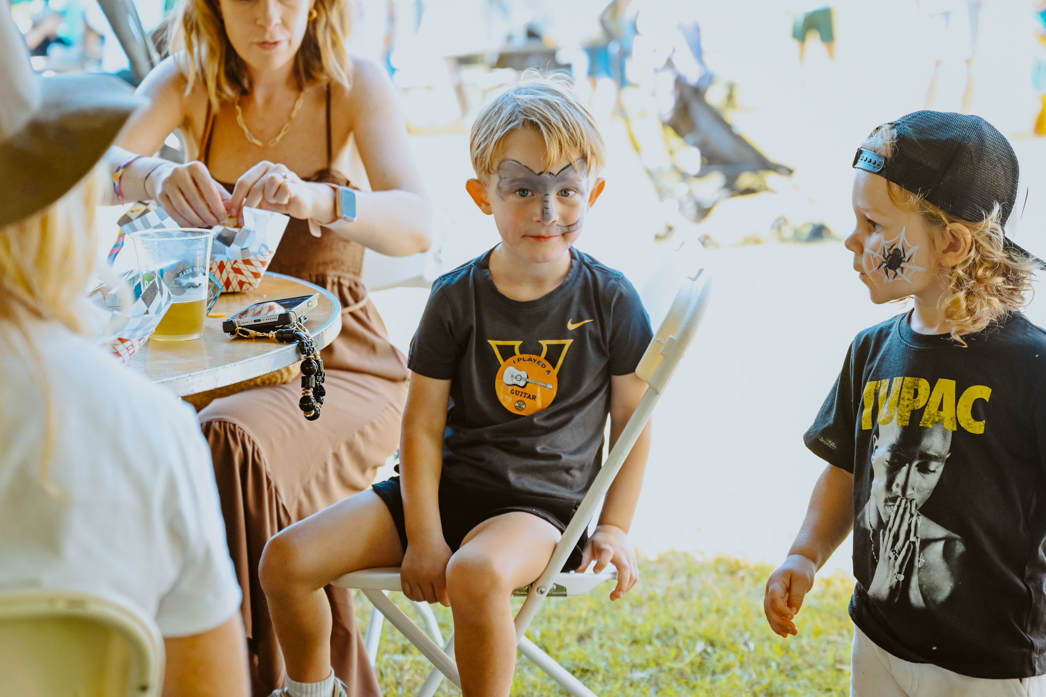 Kids making crafts at Touch of Brews 2025