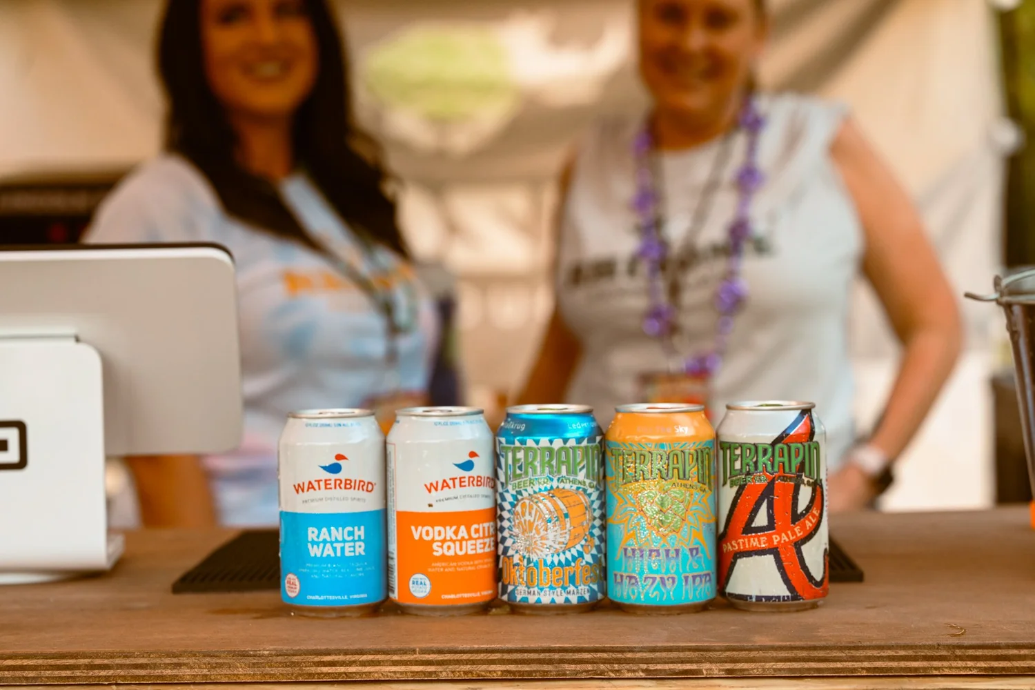 Terrapin and Waterbird cans on a tie dye table at Touch of Brews 2023